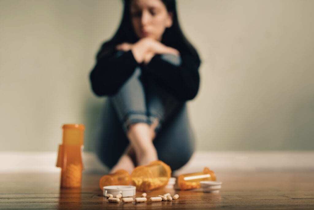 A woman in need of Prescription drug rehab in Louisville, KY.