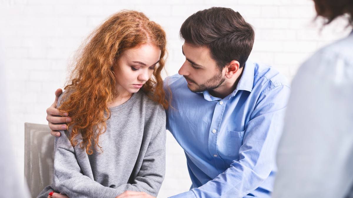 A man supporting his loved one struggling with drug addiction.