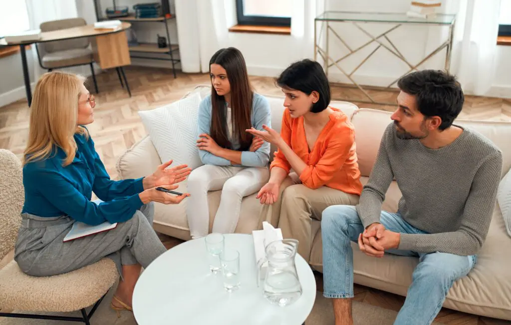 A family learns How to Help a Family Member With Addiction during treatment.