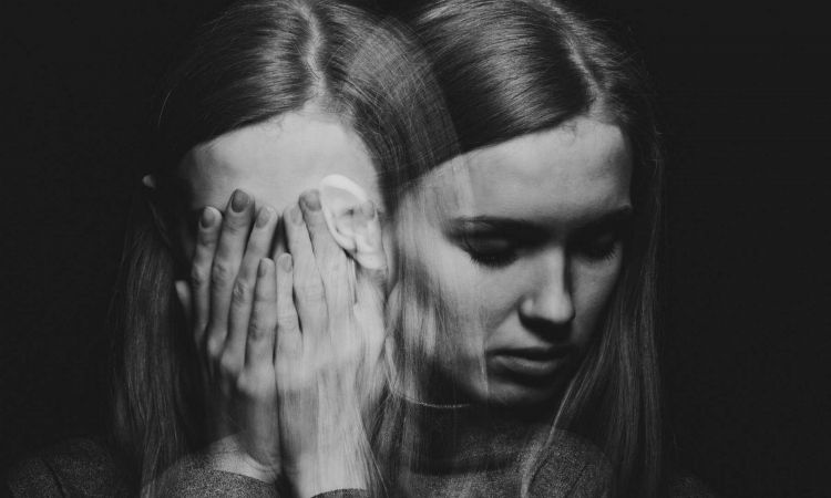 woman with bipolar disorder struggles with mood swings