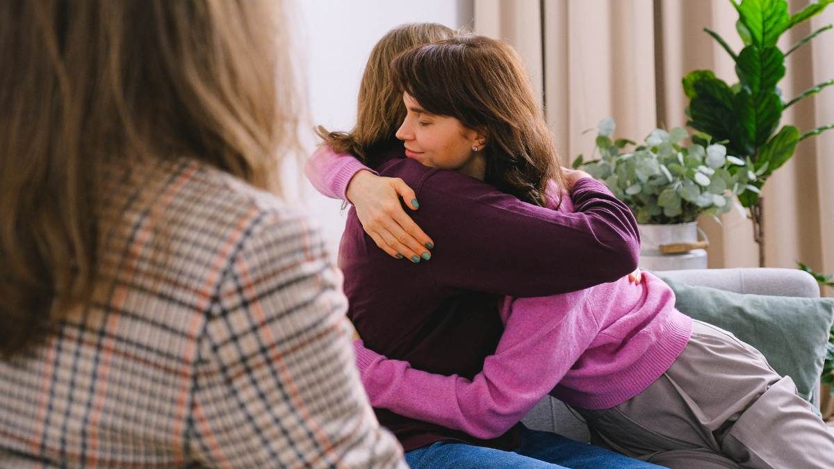 Woman hugging loved one during IOP in Louisville, KY.