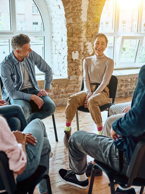 n elderly man listening attentively during a group therapy session in Murray Kentucky, highlighting drug and alcohol rehab resources available to all age groups.